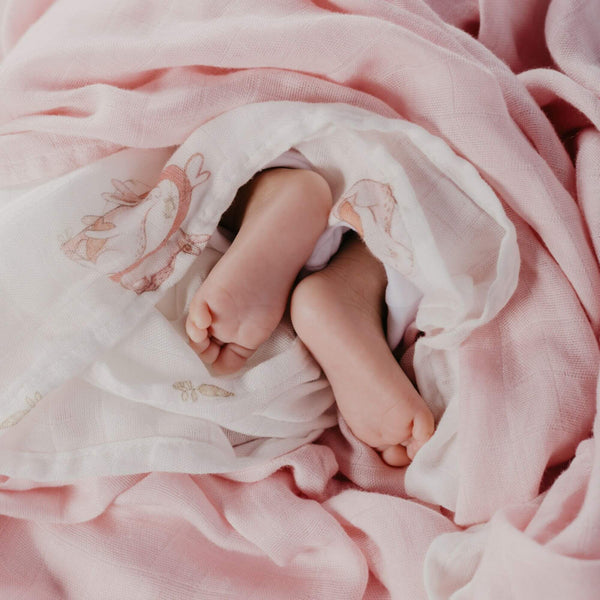 baby swaddle blankets 100% bamboo with pink bunny designs on a white background